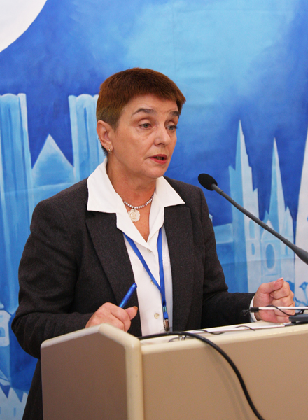 Tatiana Shutova, member of the Russian Union of Writers, is delivering a speech